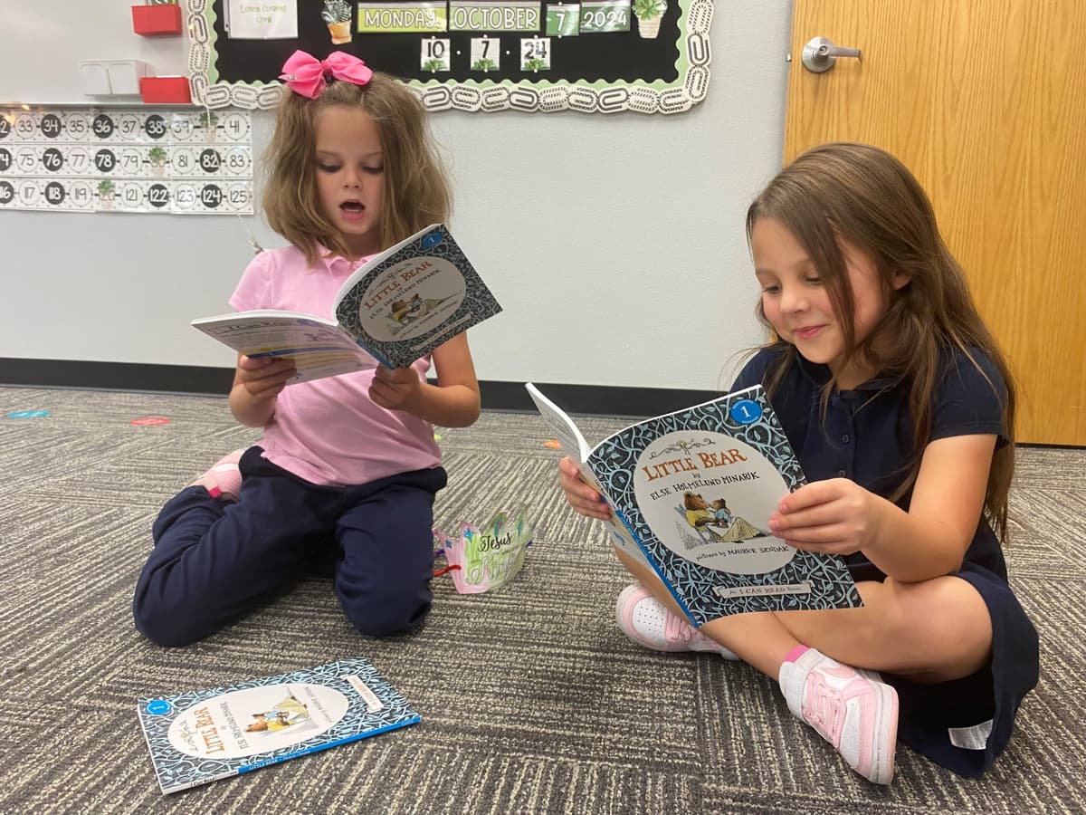 Students reading together