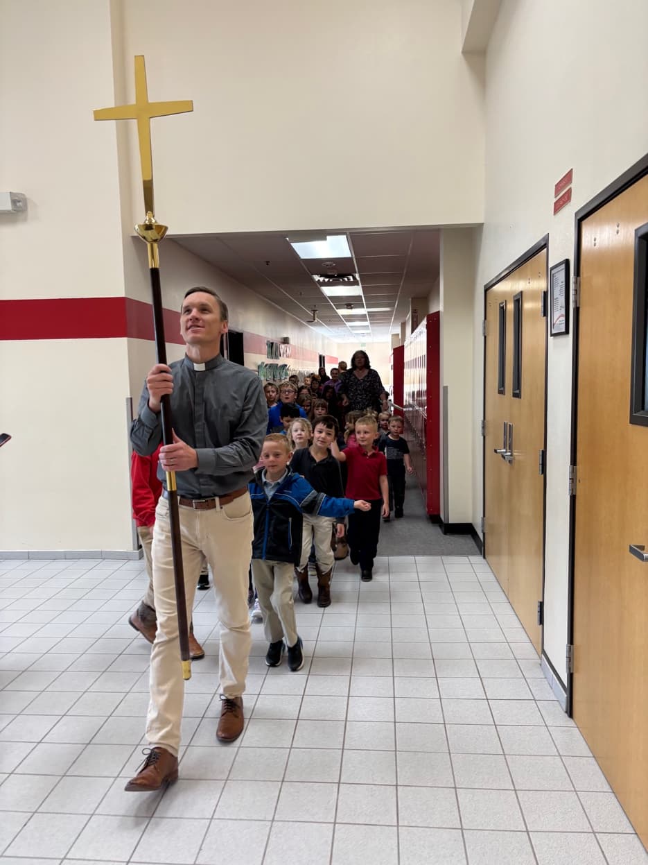 The cross procession leading the school to chapel