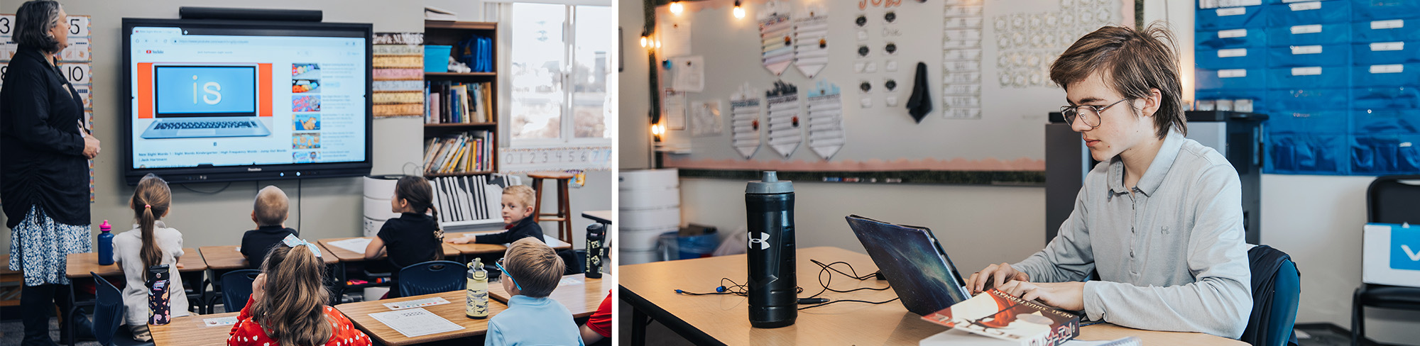 Teacher teaching from a digital board and male student working with a computer