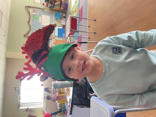 Student wearing a Christmas hat