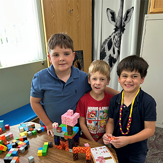 Students playing with blocks