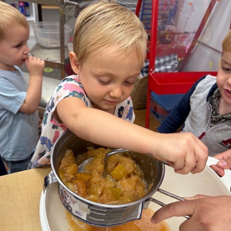 Students working with apples