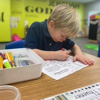 Close up of two happy elementary students in the classroom